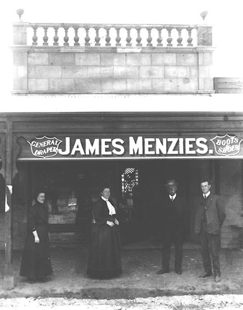 James and Kate Menzies in front of shop.jpg